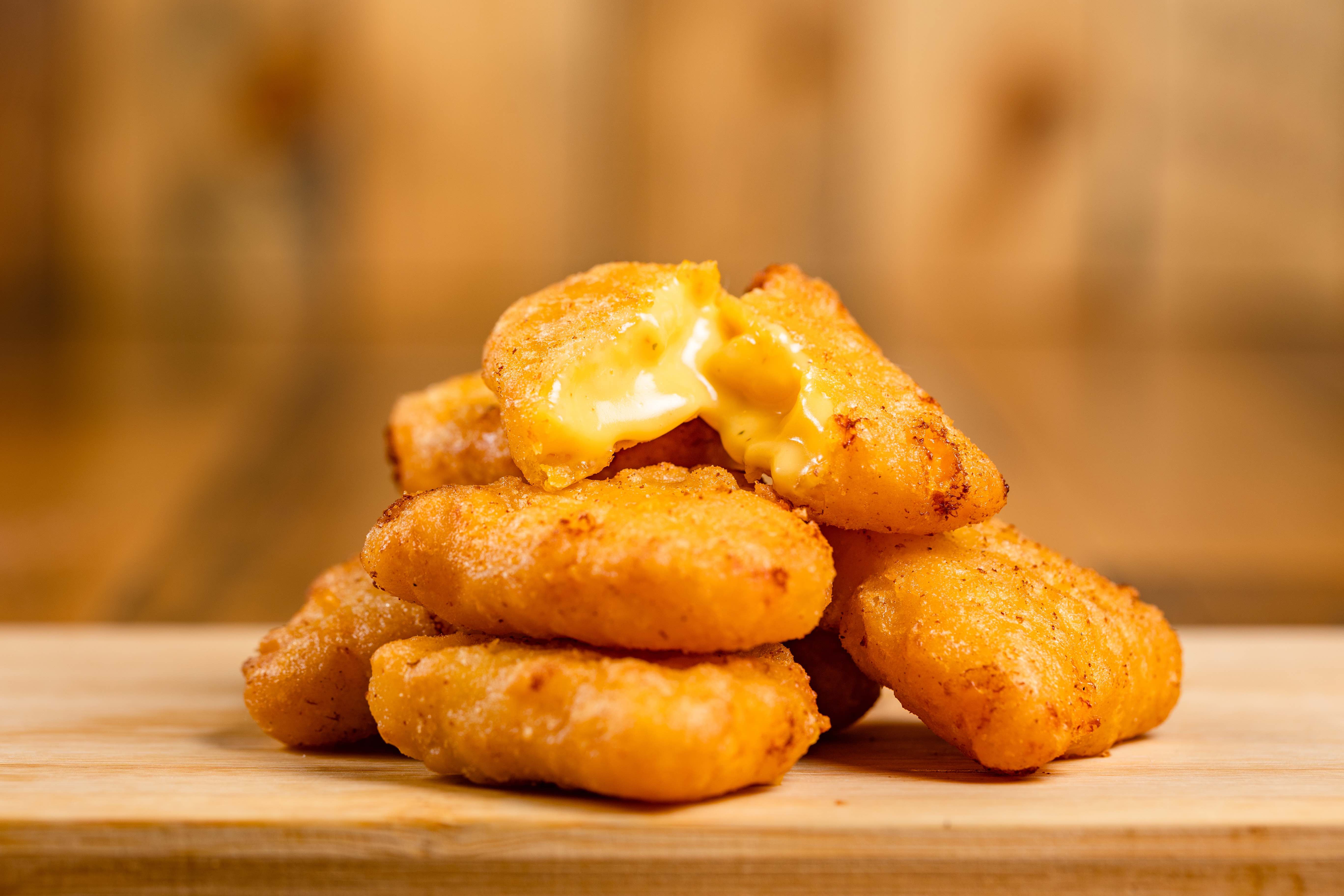 Mac N Cheese Wedges (6pc) - Six golden-fried wedges packed with mac & cheese. ...